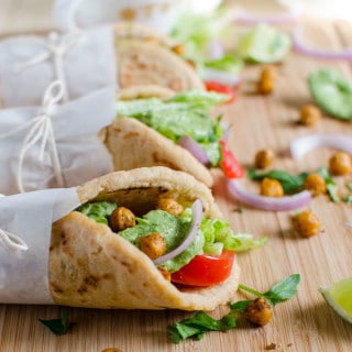 Naan bread vegan wraps filled with toasted chickpeas. This wrap is healthy and filling. No naans... then replace with pita or soft tacos.