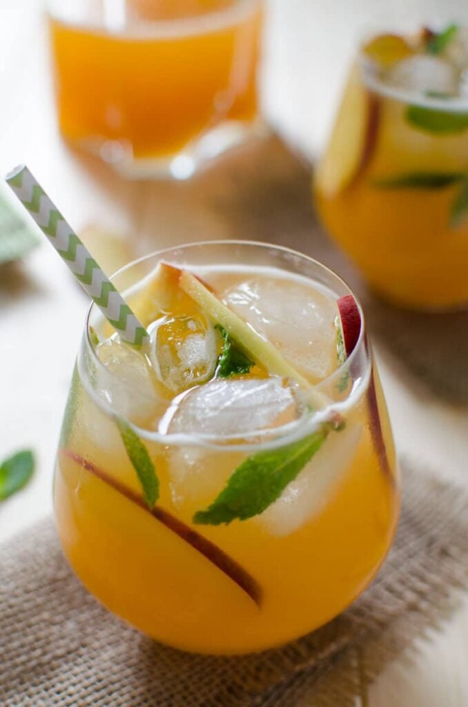 Try this peach flavored perfect lemonade recipe to enjoy fresh peaches. This peach lemonade is healthy and naturally sweetened. Kids friendly too.