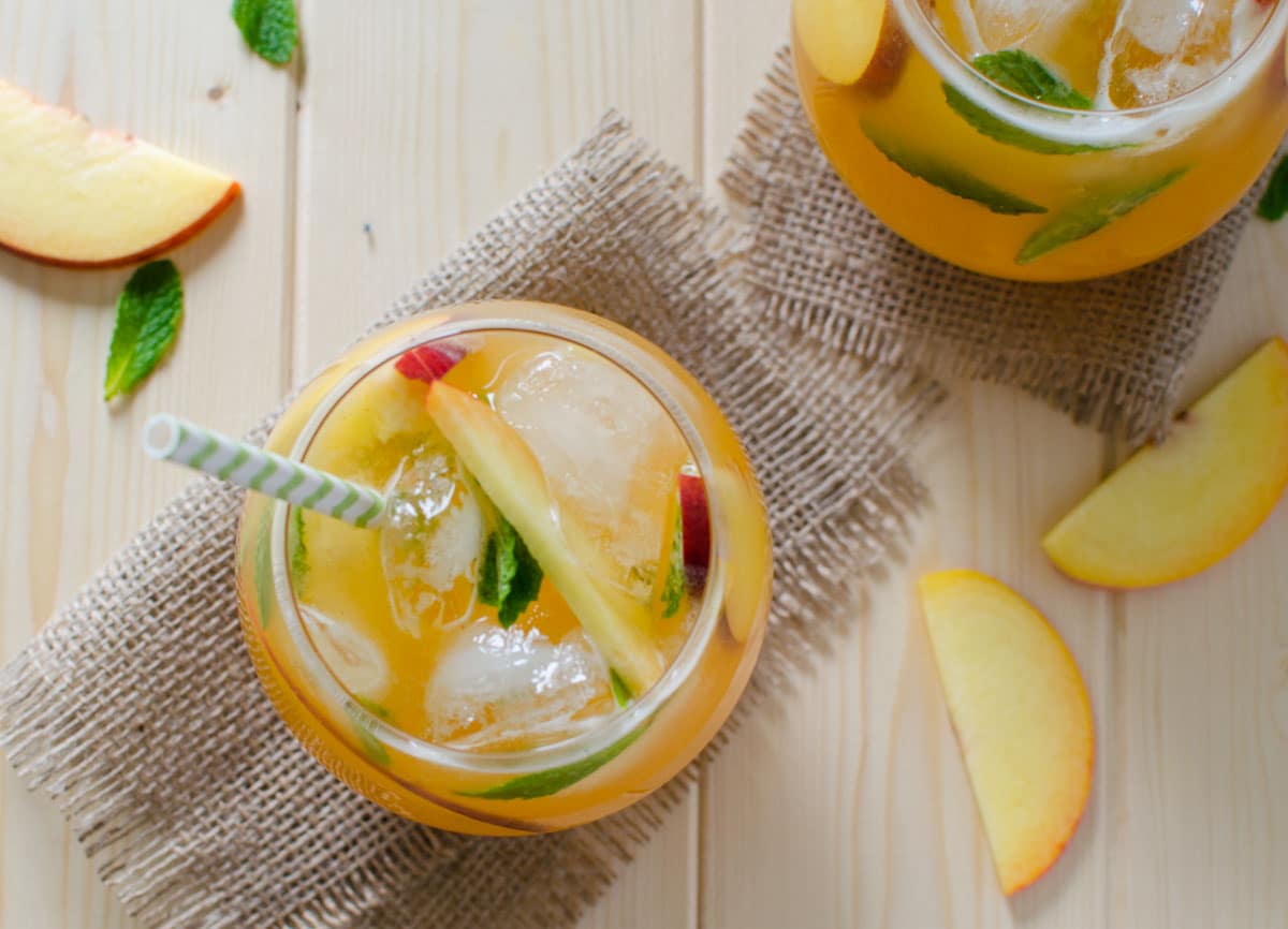 This peach lemonade is a perfect non-alcoholic drink to enjoy seasonal peaches. It is naturally sweetened and kids friendly too.