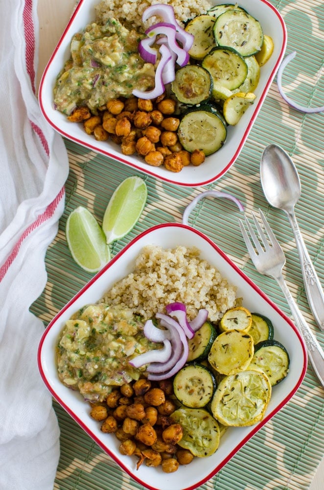 Healthy quinoa bowl that is prepared using roasted veggies like squash and zucchini.
