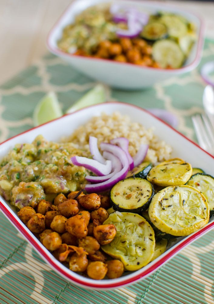 Healthy quinoa bowl that is prepared using roasted veggies like squash and zucchini. 