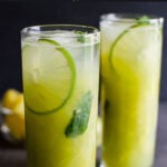 This refreshing non-alcoholic Pineapple Mojito recipe is a perfect combination of fresh fruits and mint to stay hydrated during summer. Super easy and naturally sweetened mocktail for the party or family gatherings. | #watchwhatueat #pineapple #mojito #nonalcoholic #summerdrink