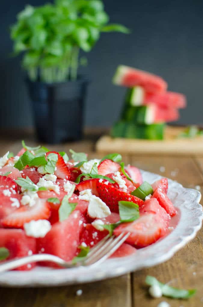 Watermelon feta basil salad in a dinner plate.