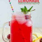 cherry lemonade in a mason jar with paper straw. Image has text overlay that reads 'fresh cherry lemonade'.