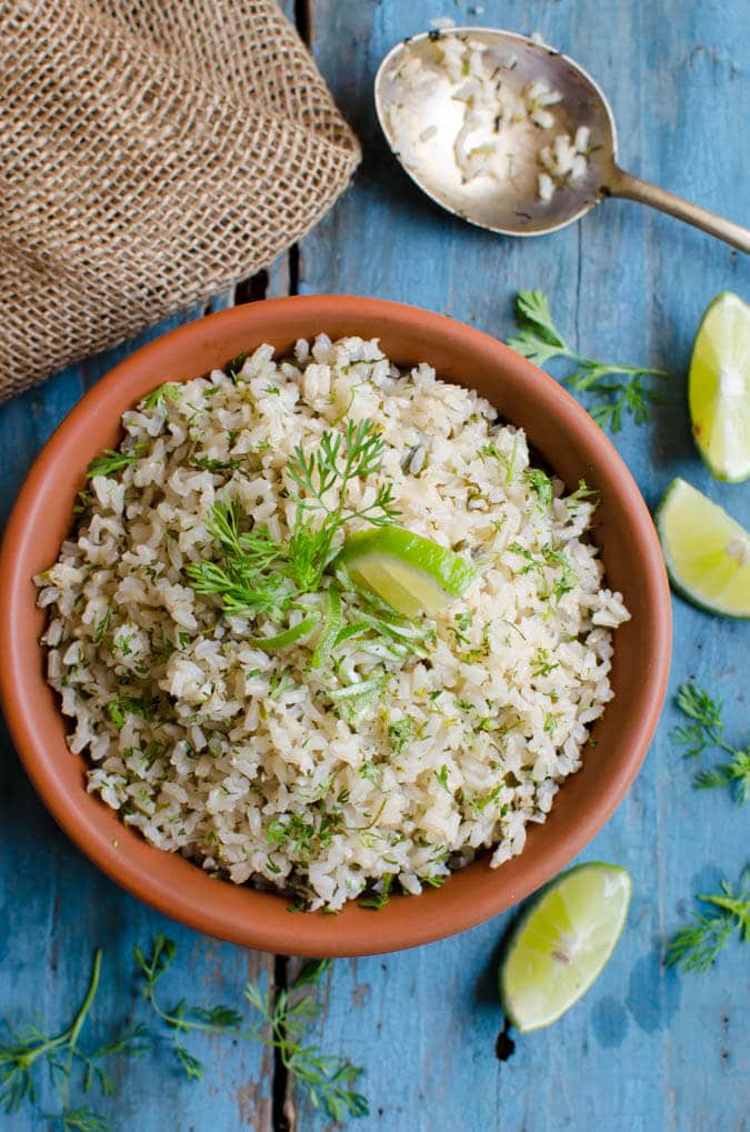 This healthy cilantro lime brown rice pairs perfectly with many Mexican dishes. It is healthy, vegan and gluten free. | watchwhatueat.com