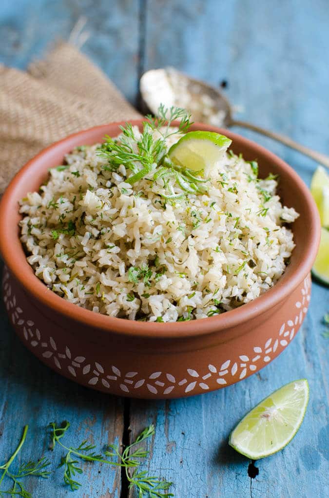 Once you try this cilantro lime brown rice recipe, I am sure you will start loving brown rice. It is also vegan and gluten free. | watchwhatueat.com