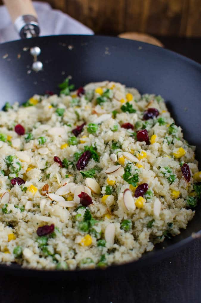 Make this 15 min one pot healthy cauliflower rice stir fry for quick lunch or dinner. Vegan, gluten free and low carb meal.| watchwhatueat.com