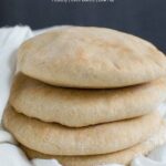 image of whole wheat pita bread with text overlay 'Whole Wheat Pita Bread'