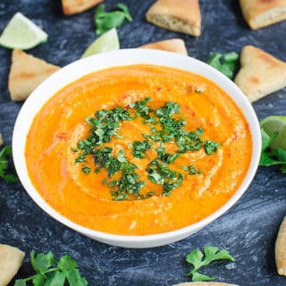 Roasted Red Pepper Hummus Recipe -- You will want to make this again & again. @watchwhatueat