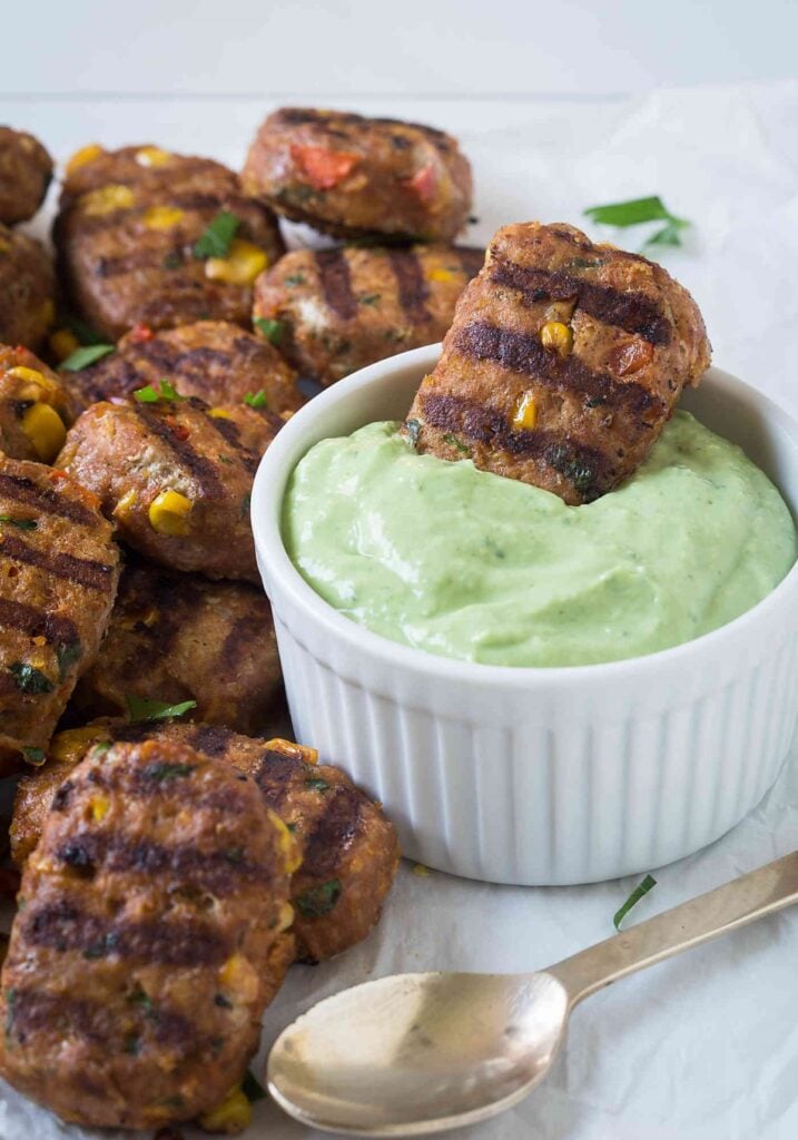 Turkey meatloaves served with a dipping sauce on the side.