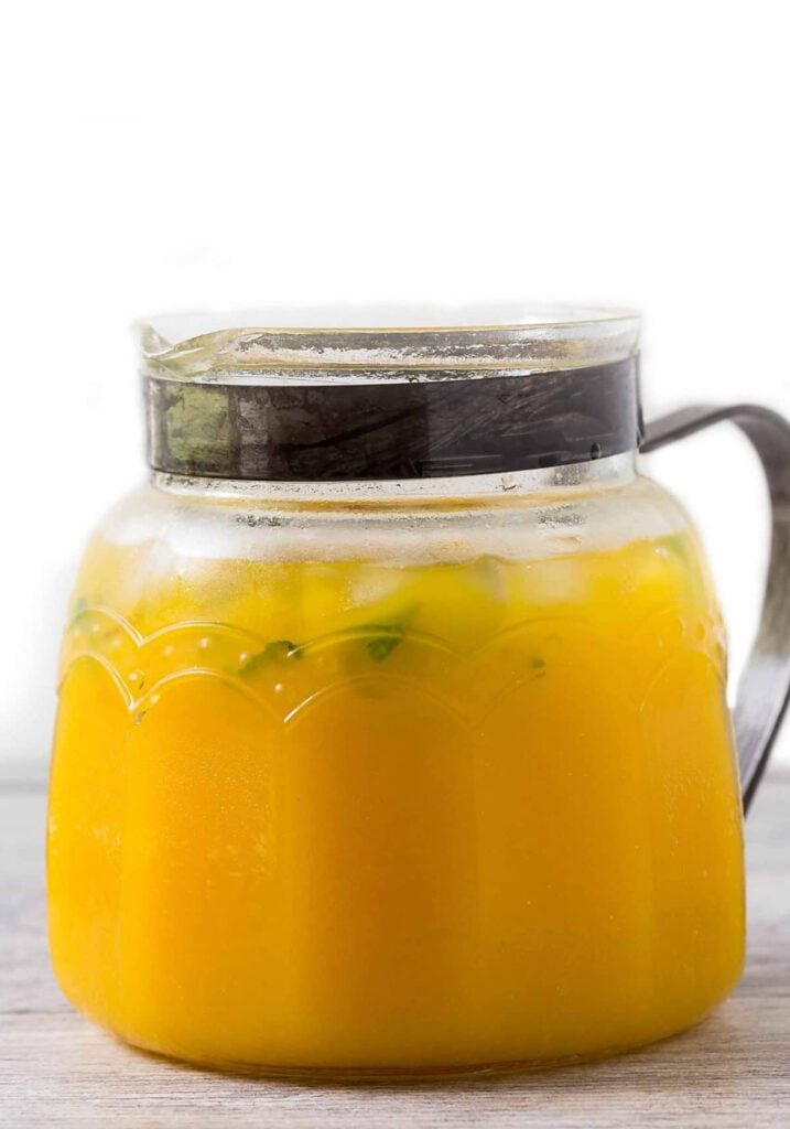 Refreshing mango lemonade to enjoy hot summer days. Prepared using fresh zesty lemon juice, honey, & mango pulp. Healthy, delicious & naturally sweetened fresh lemonade