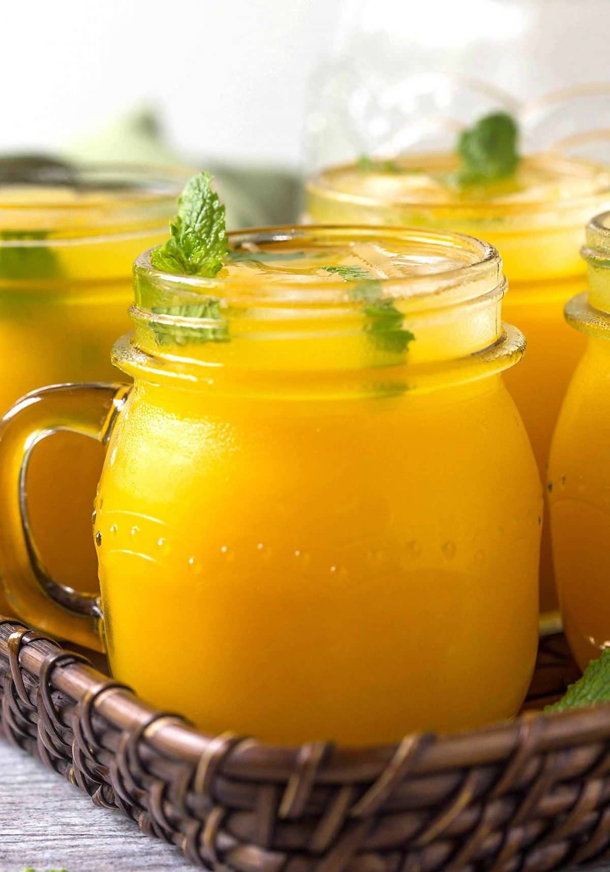 Refreshing mango lemonade to enjoy hot summer days. Prepared using fresh zesty lemon juice, honey, & mango pulp. Healthy, delicious & naturally sweetened fresh lemonade