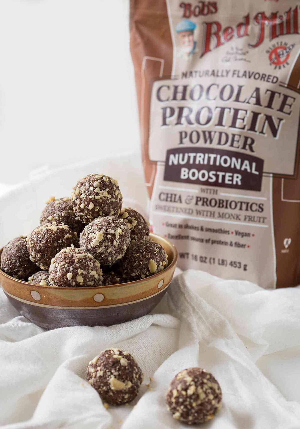 Coconut and almond butter based no bake energy balls. Nutritious and naturally sweetened.