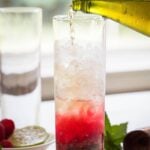 Turn fresh raspberries into this non-alcoholic Raspberry Mojito. It's a perfect drink to enjoy summer