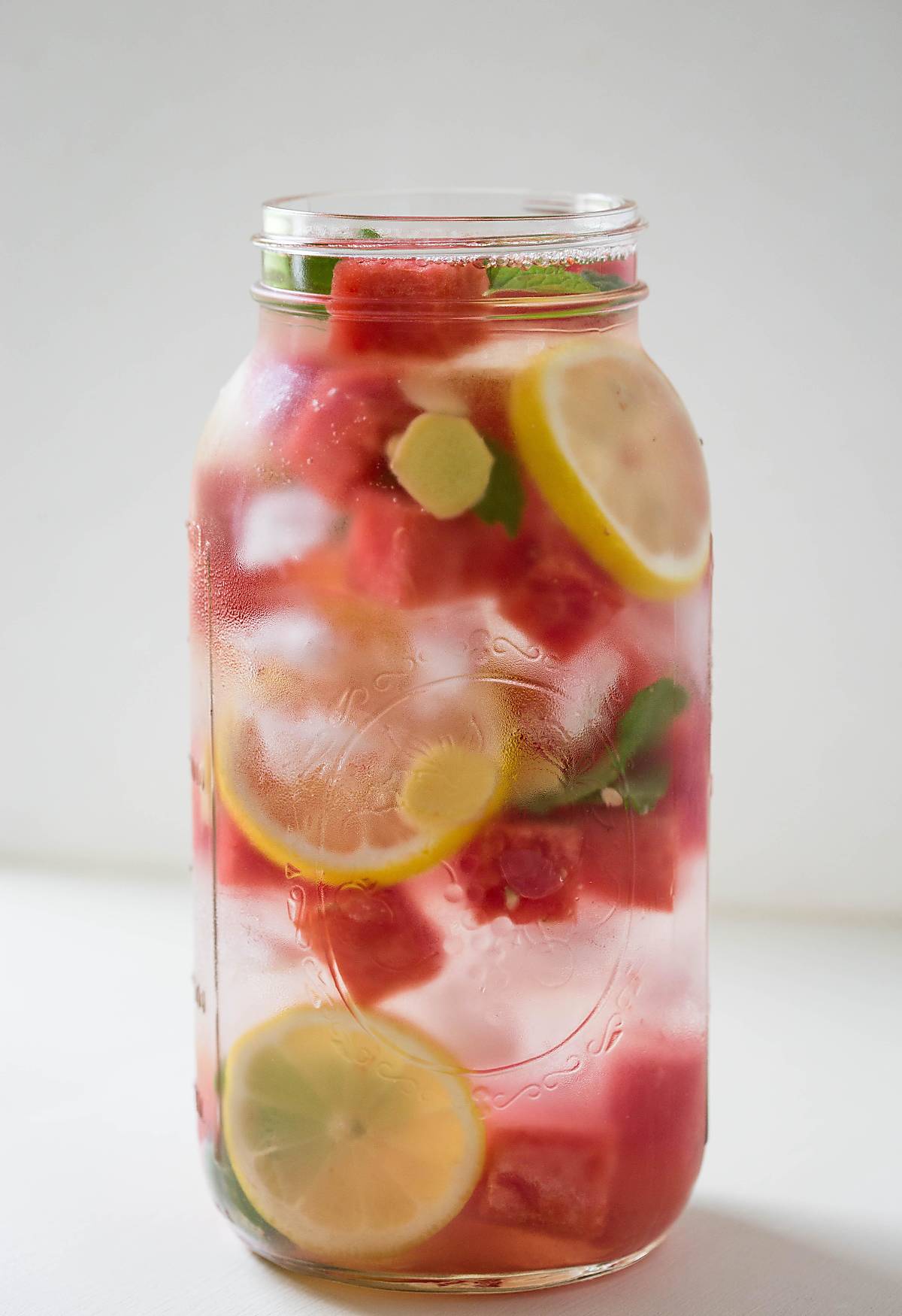 Watermelon detox water in a mason jar and is ready to serve.