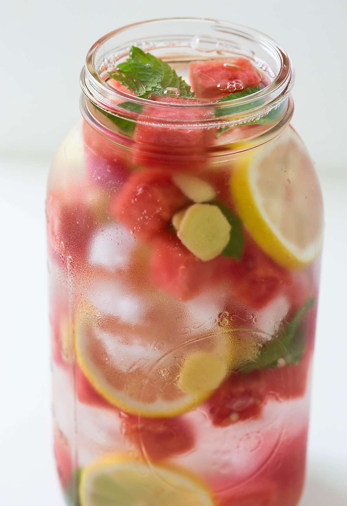 Watermelon detox water in a mason jar and is ready to serve.