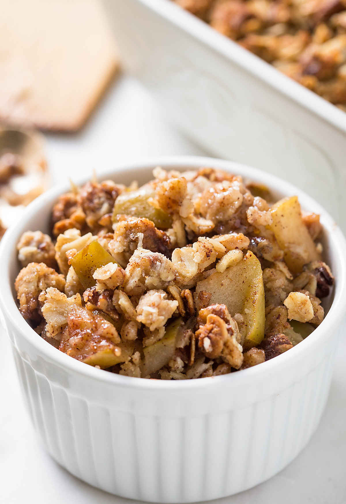 This easy and healthy apple crisp recipe is perfect for enjoying dessert guilt-free. No one will notice that it is skinny with no butter and white sugar.