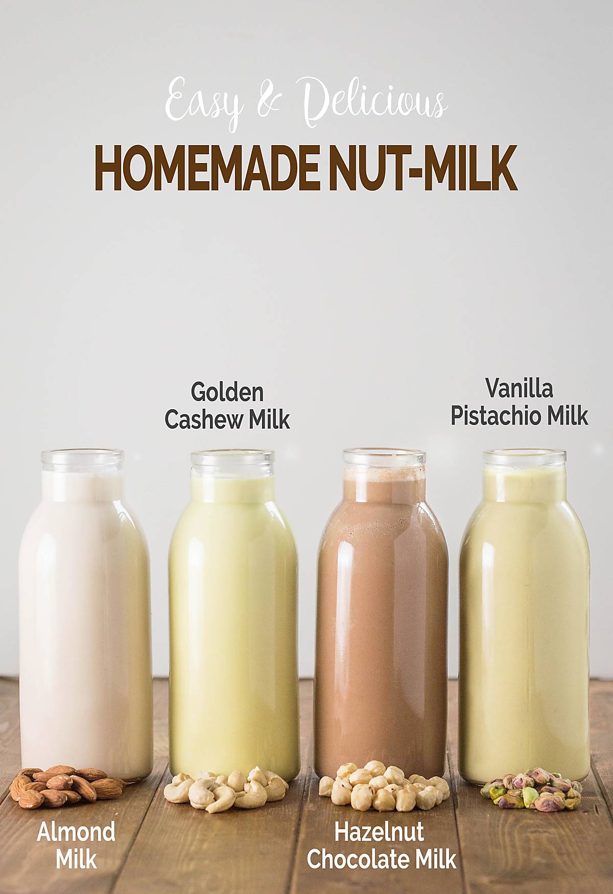 Different kinds of nut milk in glass bottles.