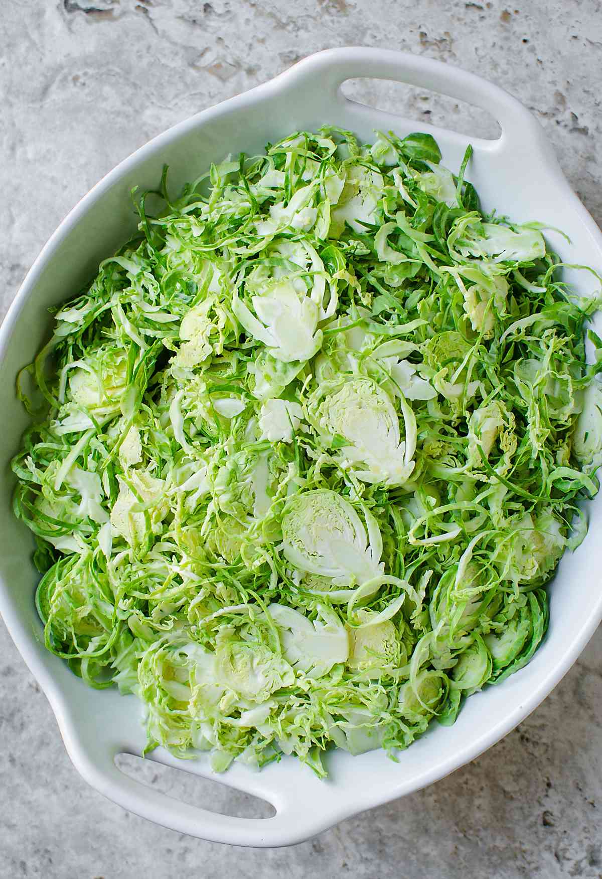 Shredded brussels sprouts in a bowl.