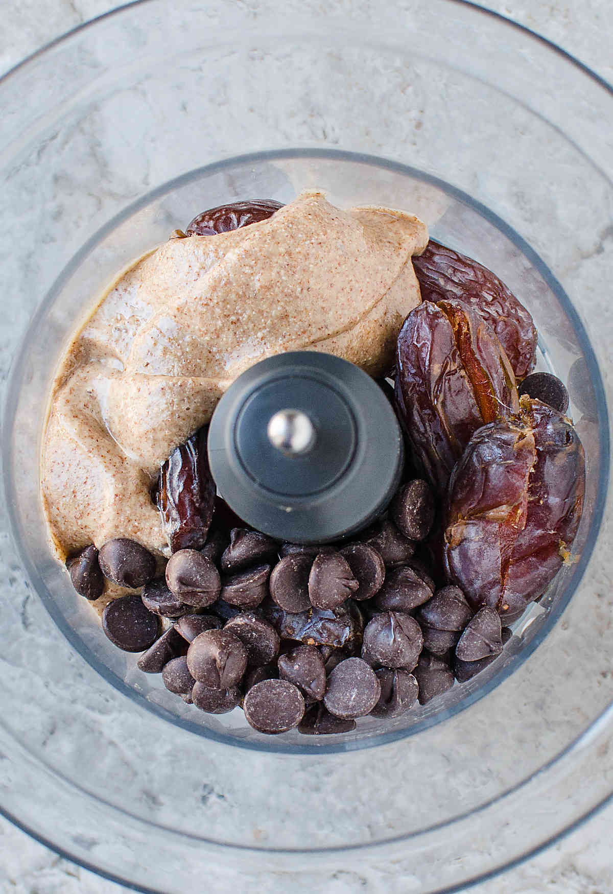 Preparing ingredients for dates almond chocolate truffles.