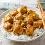 Asian chili garlic tofu recipe - a quick, easy and simple meatless dish you can prepare for lunch or dinner. #tofu #vegan #meatless #asian