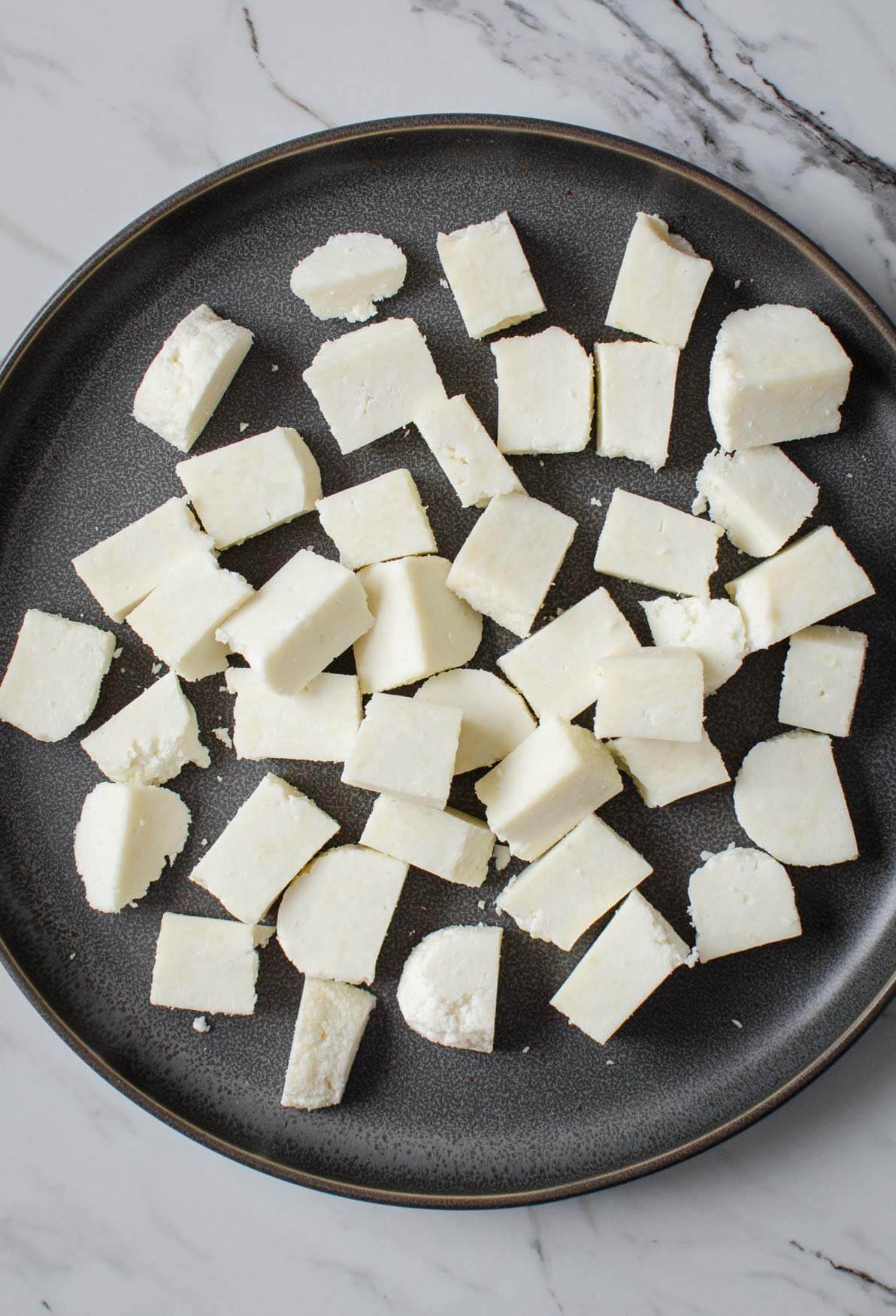 Fresh paneer or Indian cheese or Indian cottage cheese for making palak paneer rice