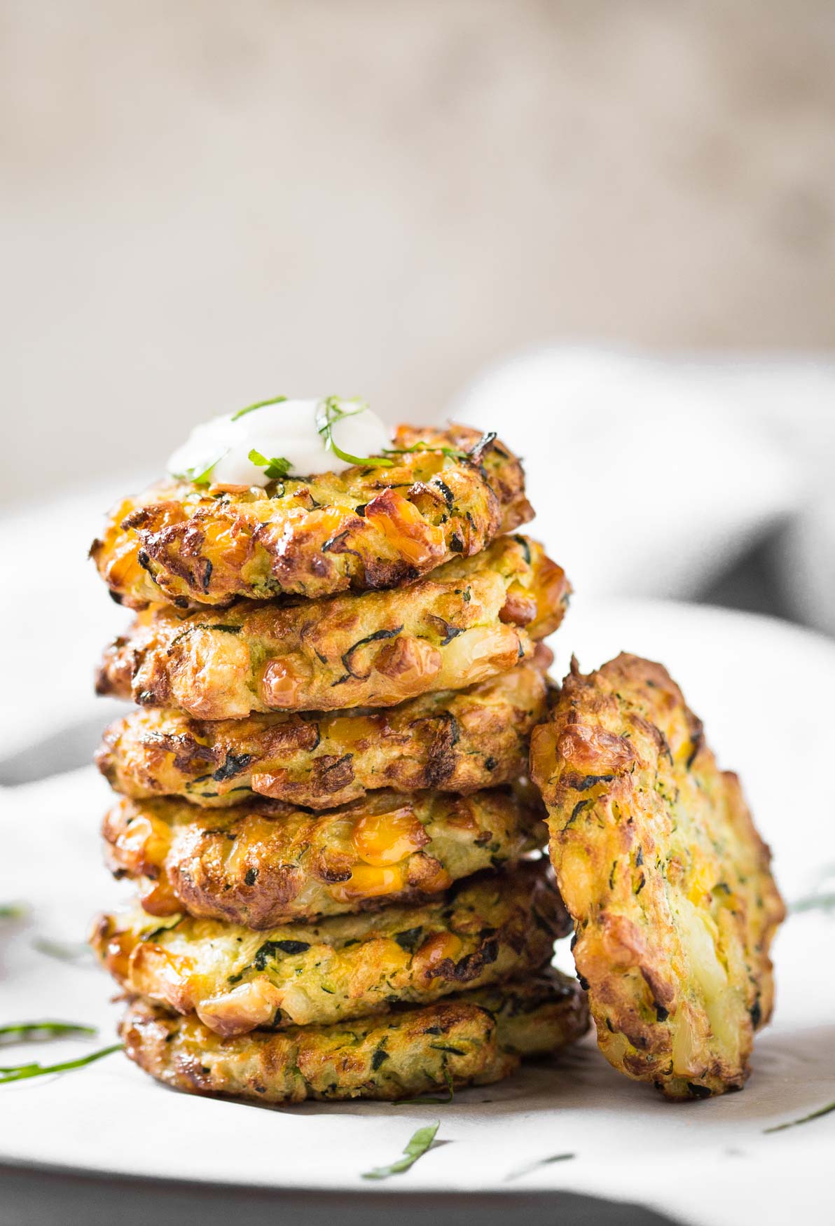 A stack of Air Fryer zucchini fritters ready to serve.