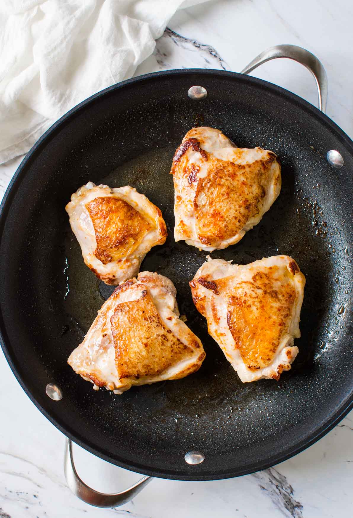 Preparing chicken thighs for making healthy Mexican chicken rice