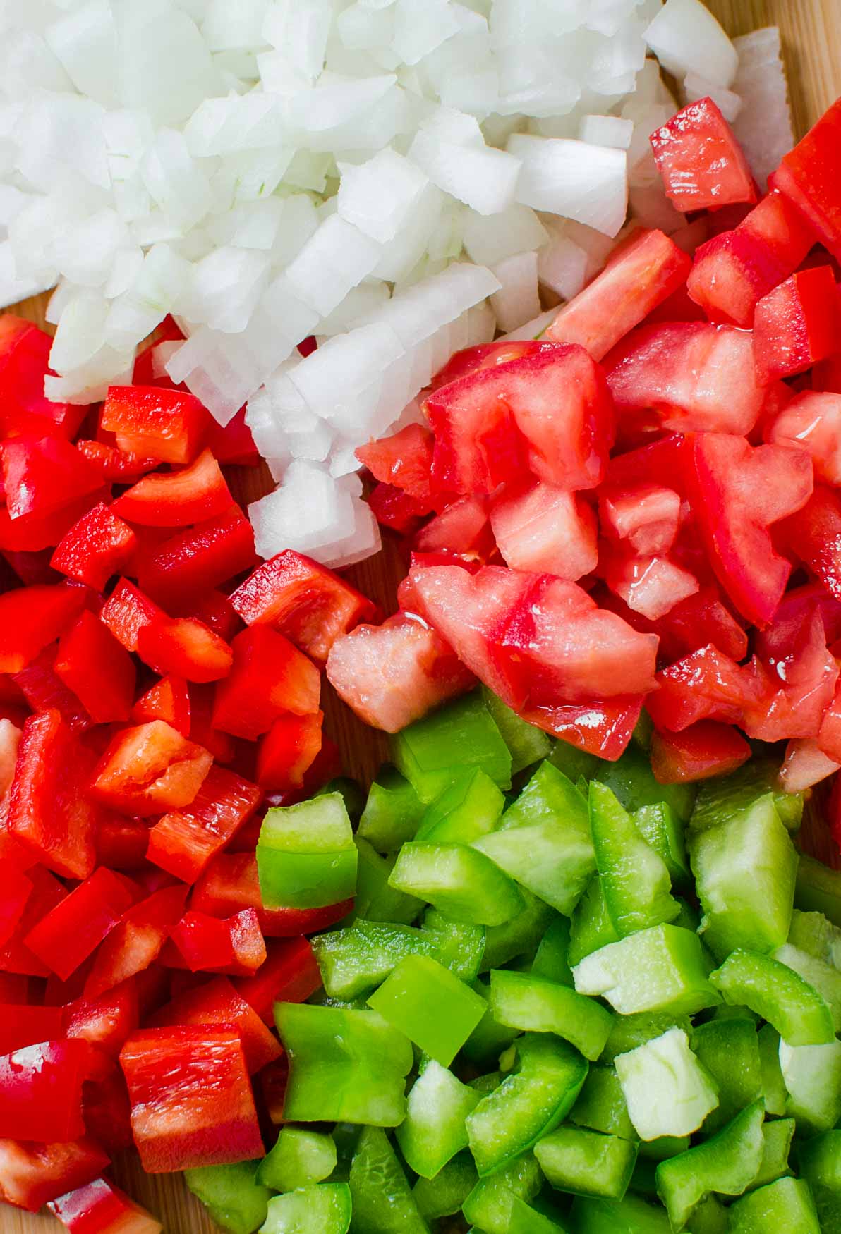 Diced red and green pepper, onion and tomato for making black bean soup