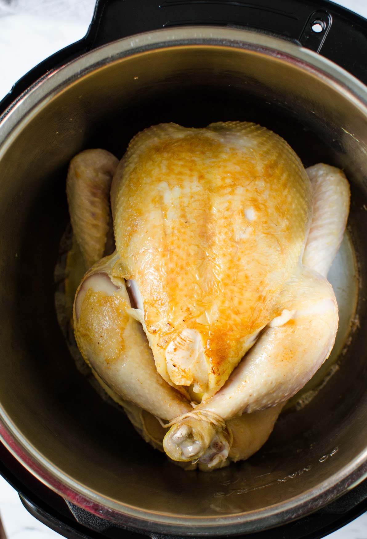 Seared whole chicken in Instant Pot.