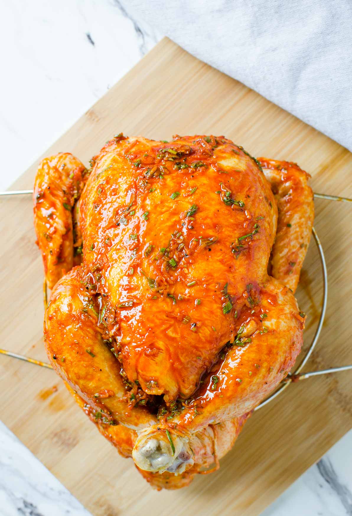 Garlic and herbs rubbed over the whole chicken