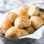 Healthy Whole Wheat Dinner Rolls - use this recipe to make easy, soft & fluffy dinner rolls at home. Add fresh garlic and herbs to give them an absolute taste. The best part is no one will ever believe that these are made from 100% whole wheat flour. | #watchwhatueat #dinnerrolls #wholewheat #wholewheatrolls #healthythanksgiving