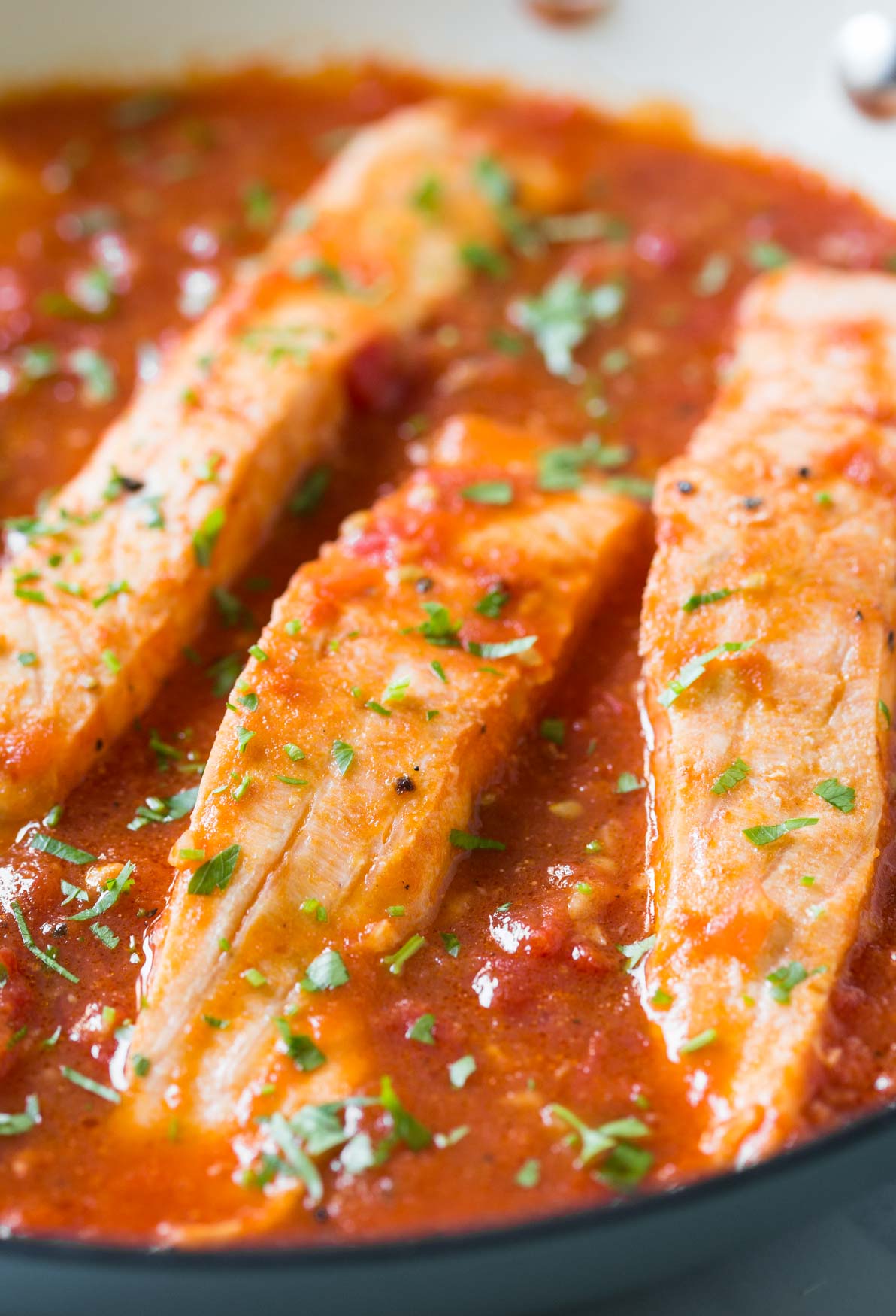 Salmon in Tomato Sauce - Under 30 min quick and easy weeknight meal. Serve with pasta, grits or plain rice.