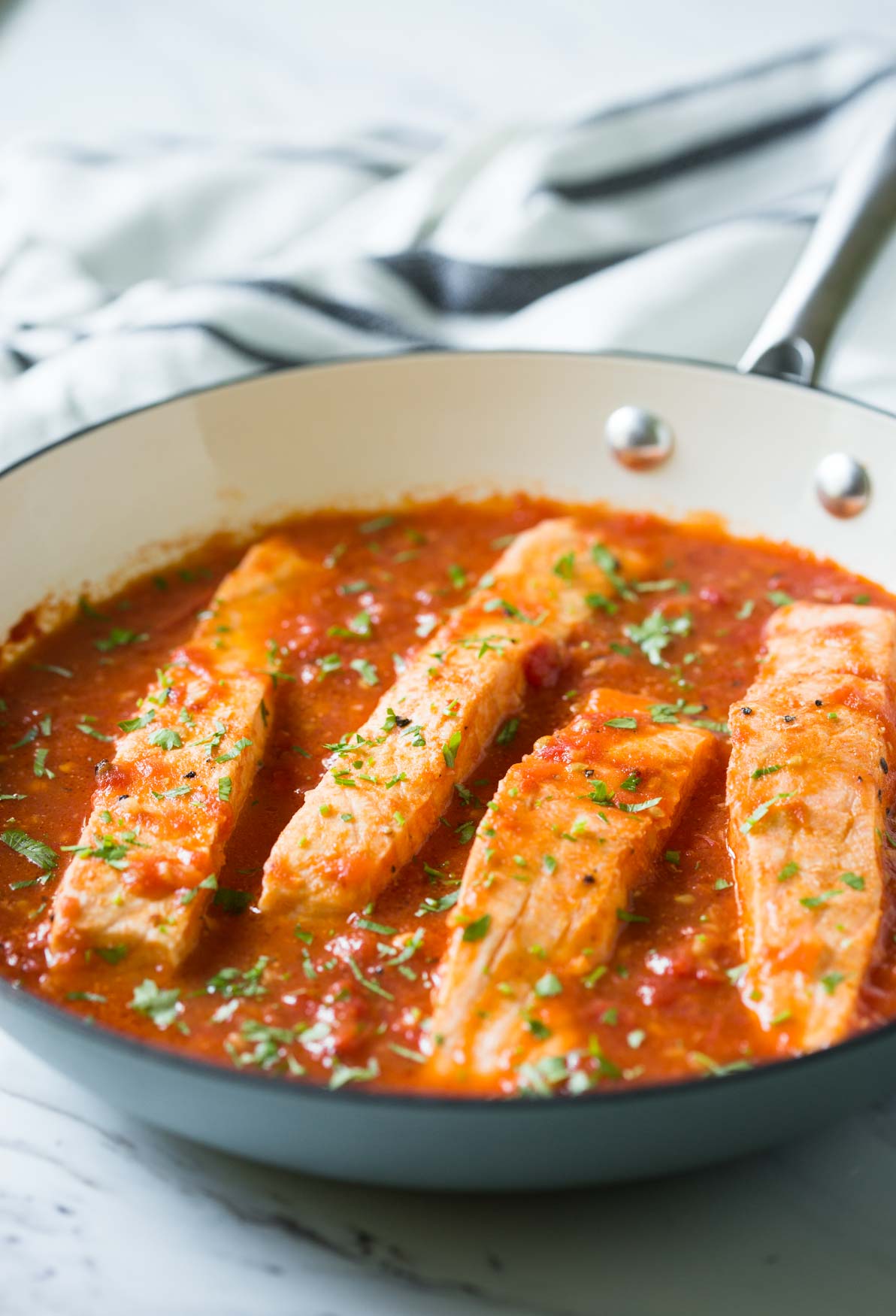 Salmon in Tomato Sauce - Under 30 min quick and easy weeknight meal. Serve with pasta, grits or plain rice.
