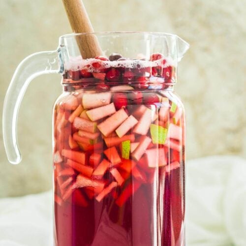 Cranberry Sangria in a large pitcher is ready to serve