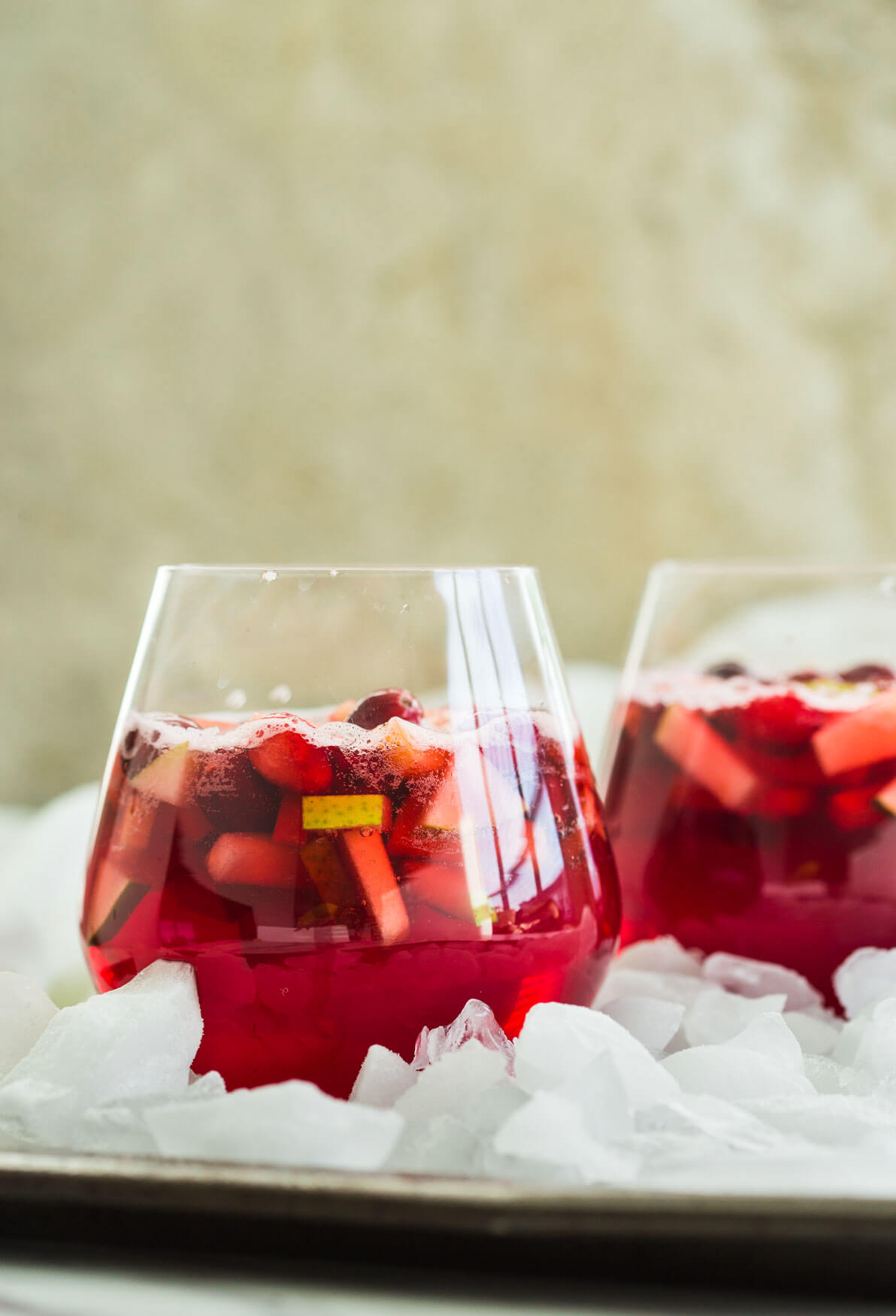 healthy cranberry sangria in serving glasses