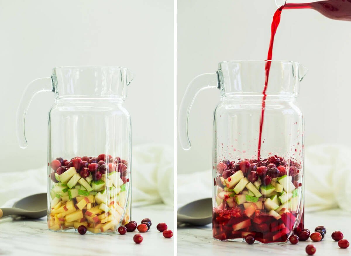 fresh diced fruits in a pitcher and fresh cranberry juice for making healthy cranberry sangria