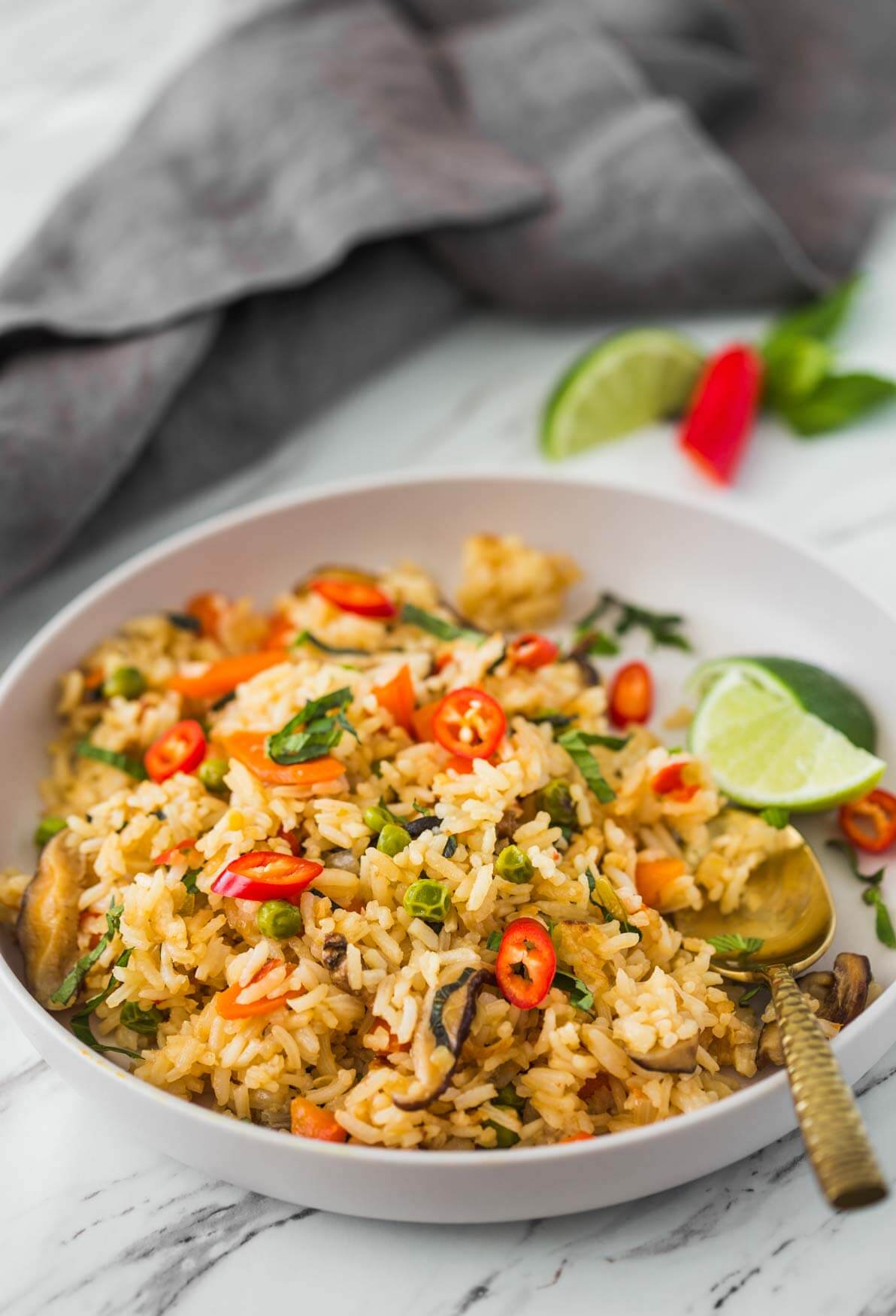 Thai fried rice with vegetables in a serving plate