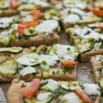 zucchini flat bread slices in the baking tray