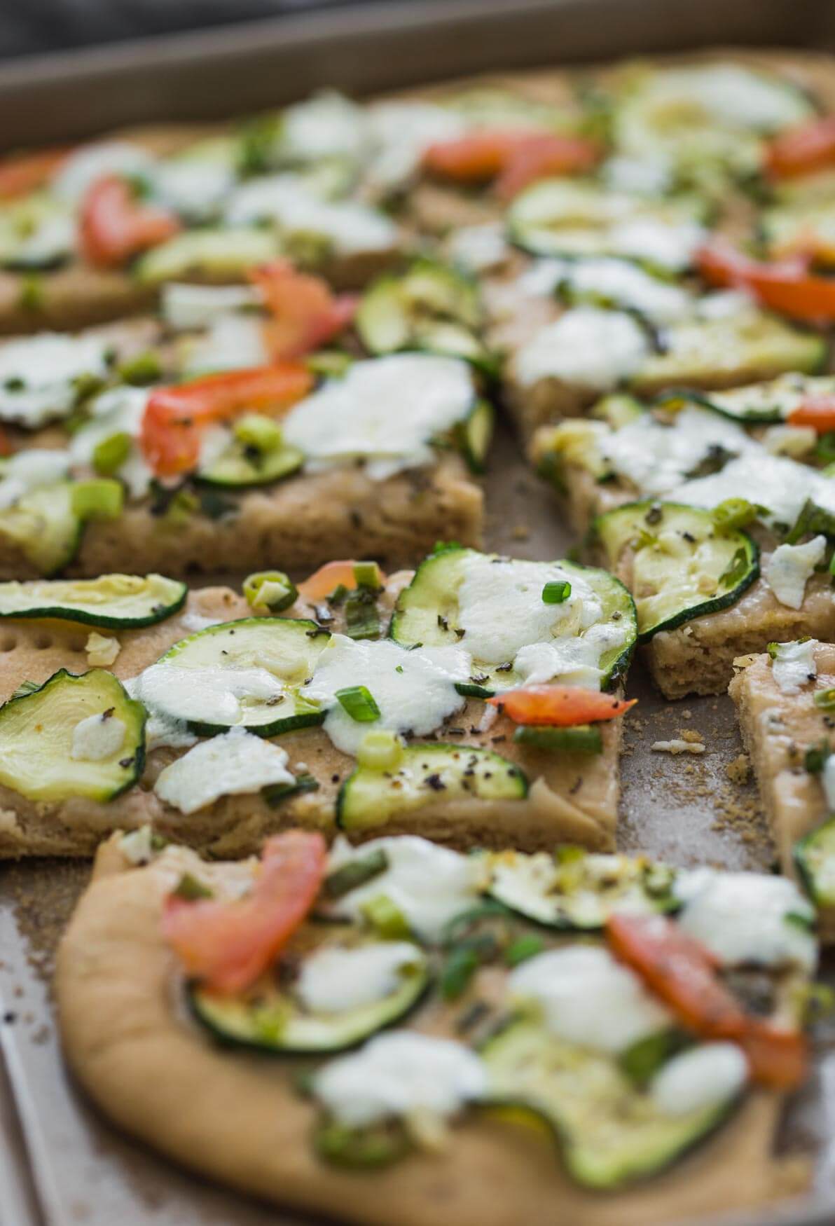 zucchini flat bread slices in the baking tray