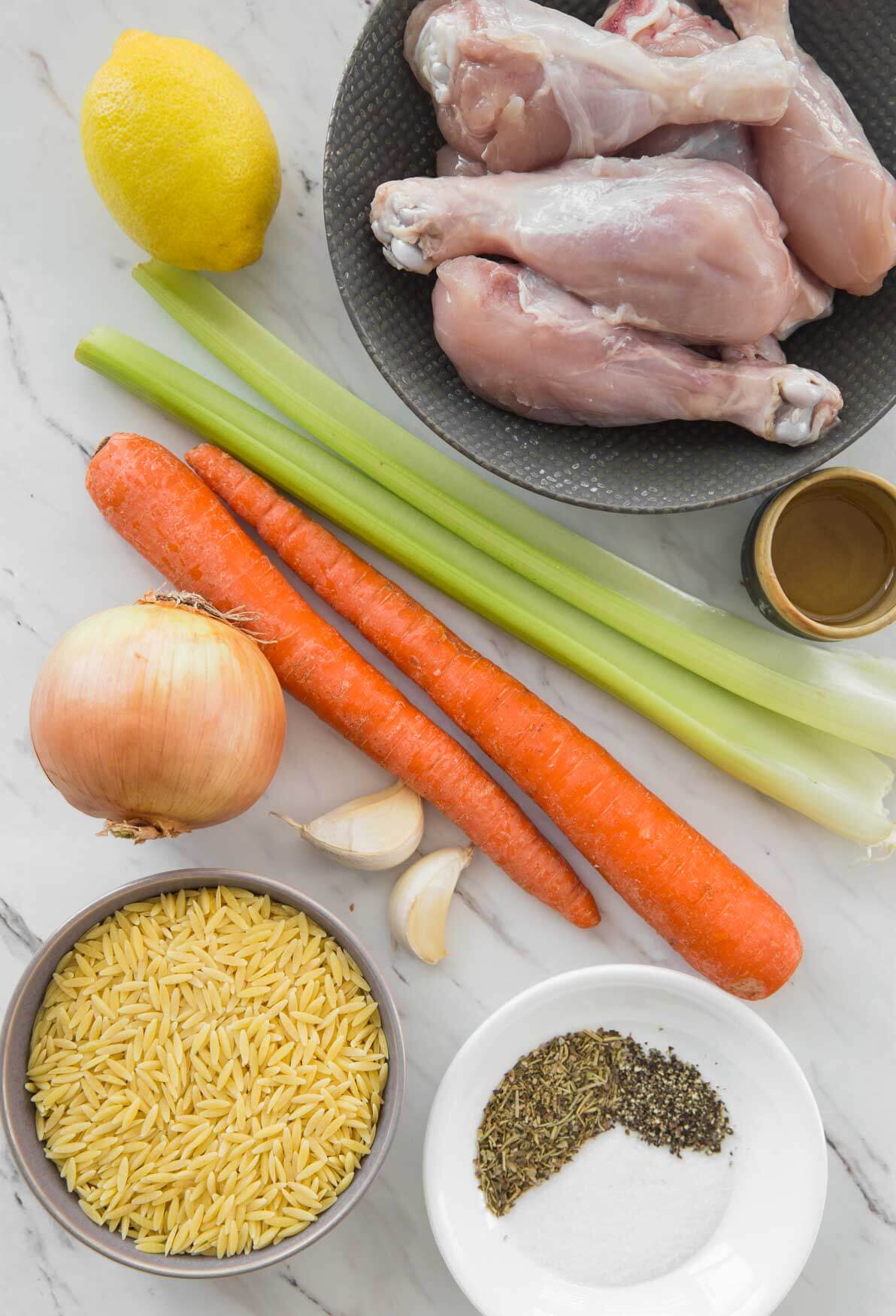 Image of different ingredients needed for making chicken orzo soup