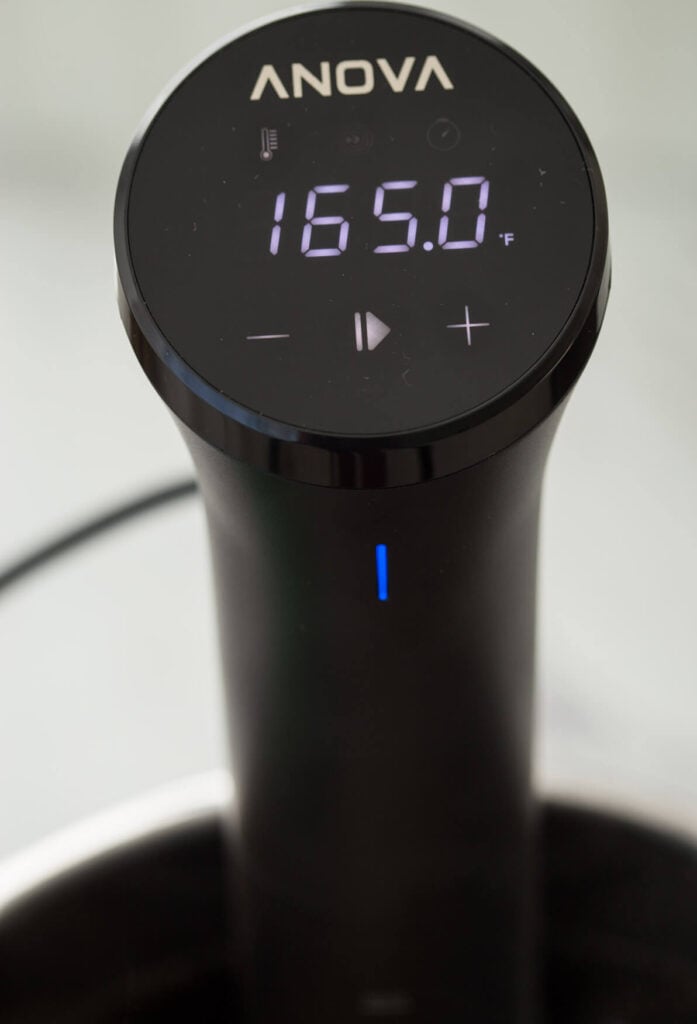 Anova Sous Vide Cooker Nano shows the desired temperature on its display.