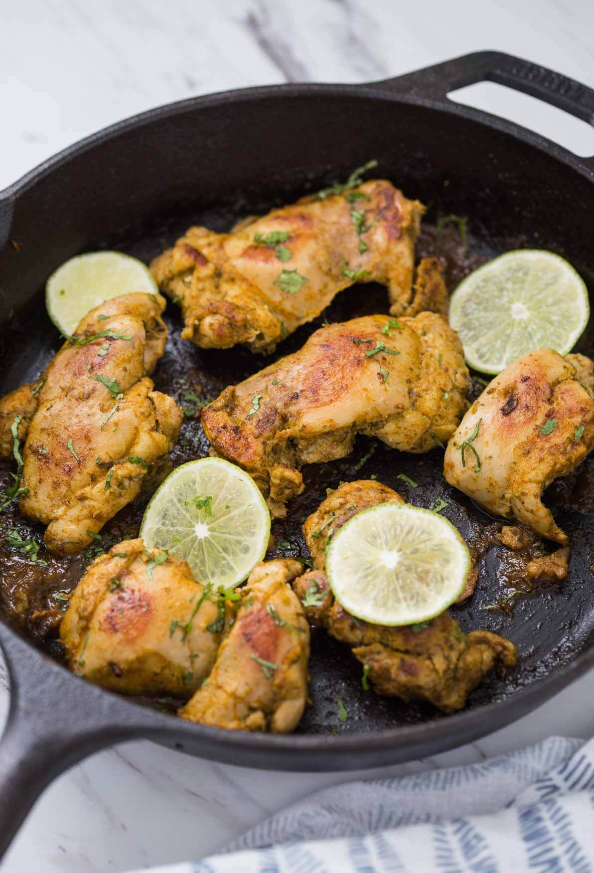 Image of sous vide chicken thighs after searing in cast iron pan.