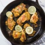 Image of sous vide chicken thighs after searing in cast iron pan.