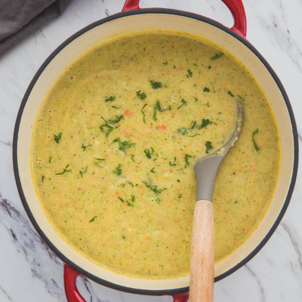 blended detox broccoli soup in a dutch oven with serving ladle