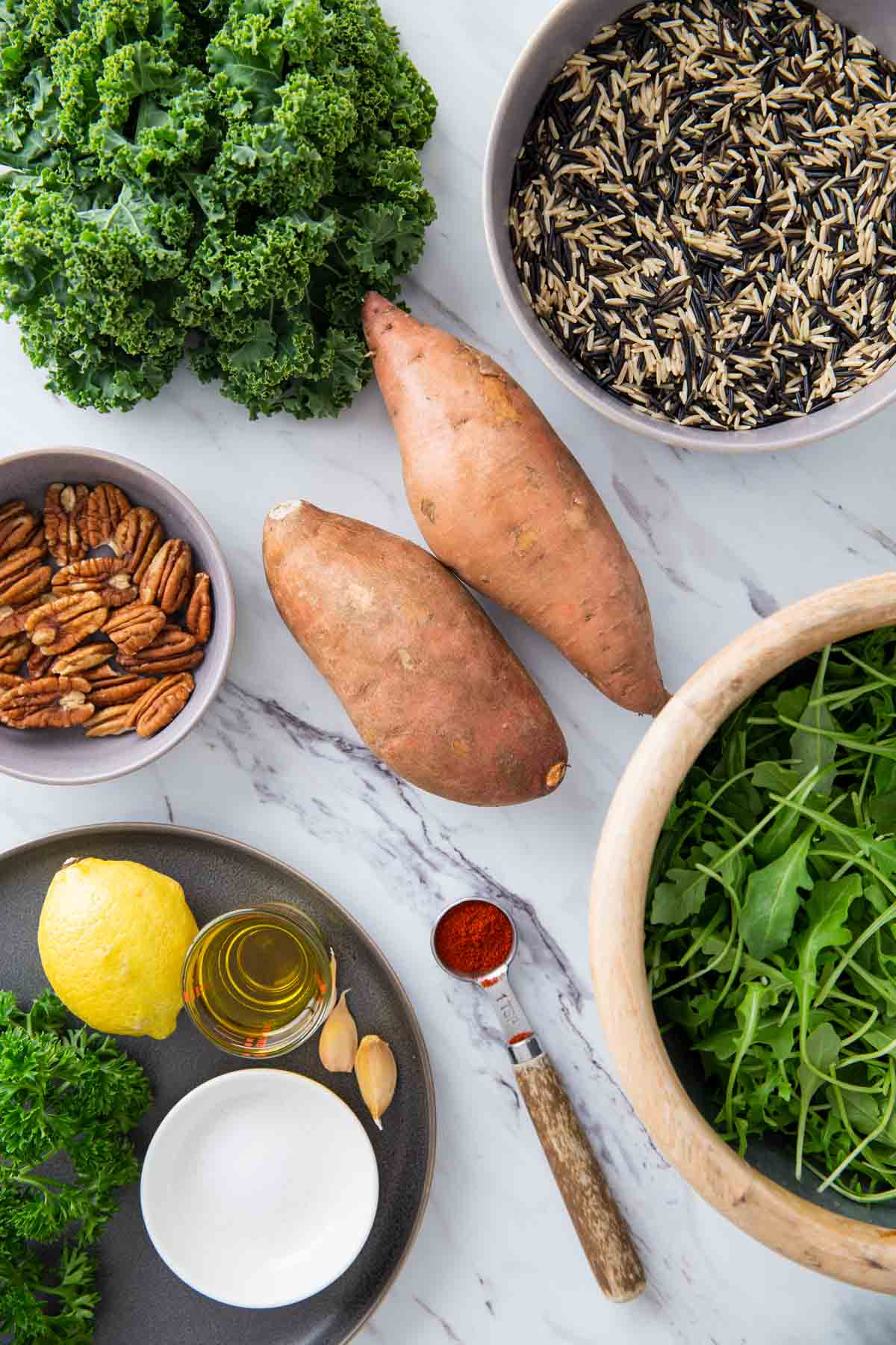 Ingredients for wild rice salad with sweet potato and kale.