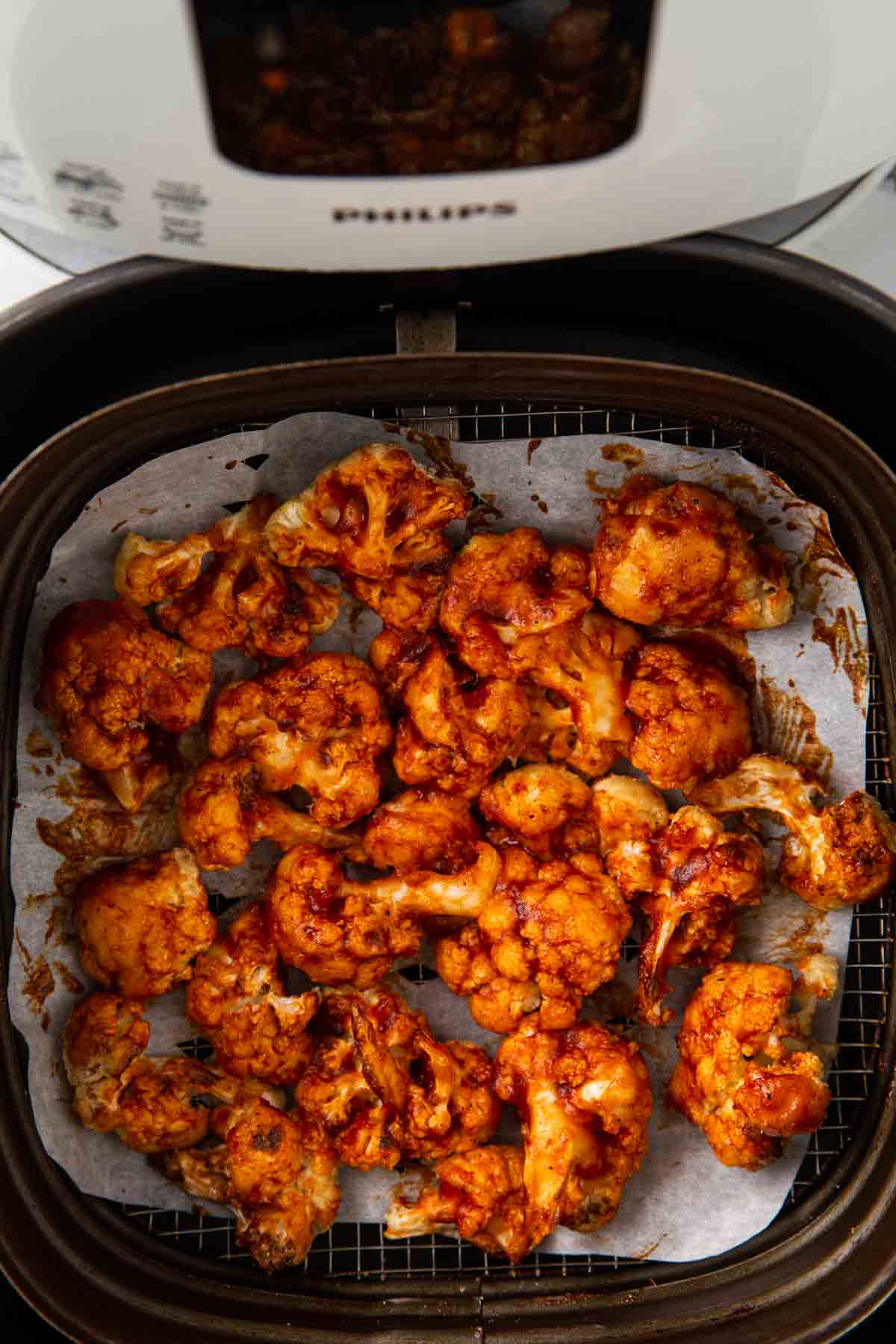 Air fryer cauliflower wings with bbq sauce just after cooking is over