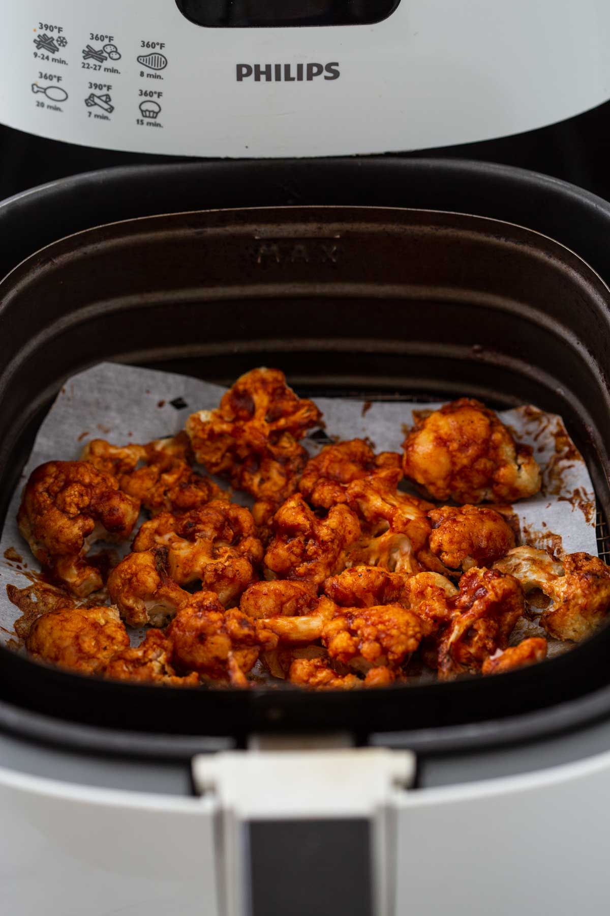 Air fryer cauliflower wings with bbq sauce just after cooking is over