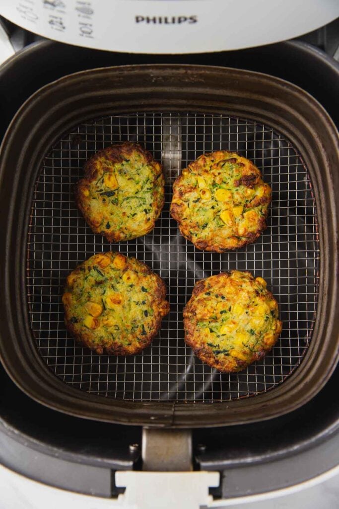 Air Fryer zucchini corn fritters after the cooking is complete. 