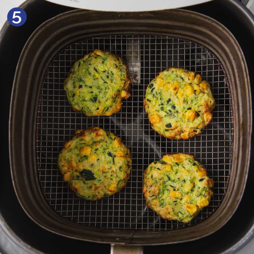 Cooking zucchini fritters in the Air Fryer. 